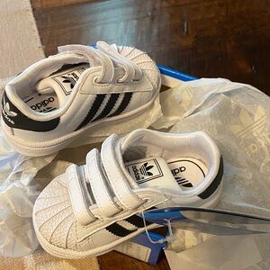 Adidas Baby White Sneakers with Black Stripes